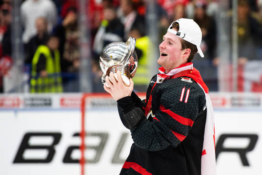 Alexis Lafreniere of Canada celebrates