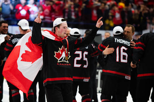 Alexis Lafreniere of Canada celebrates