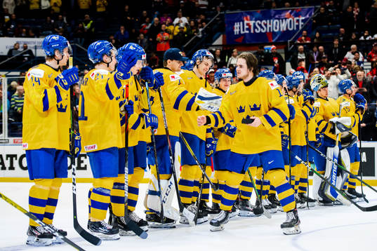 Samuel Fagemo of Sweden celebrate with teammates