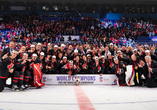 Team Canada celebrate with the trophy