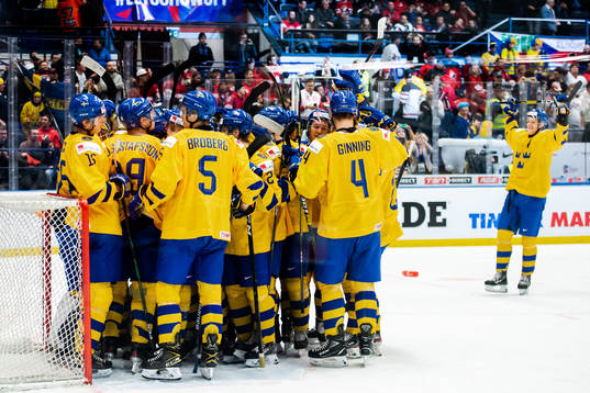 Players of Sweden celebrate