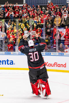 Goalkeeper Joel Hofer  of Canada celebrates
