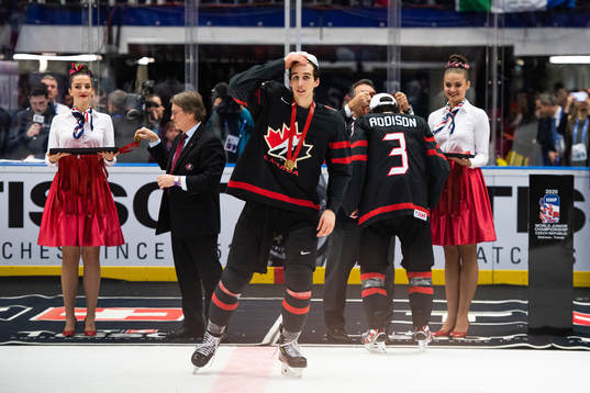 Dylan Cozens of Canada celebrates