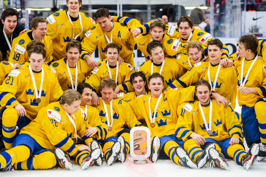 Players of Sweden celebrates