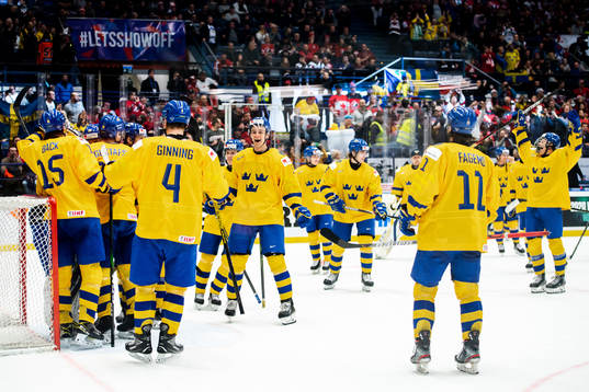 Players of Sweden celebrate