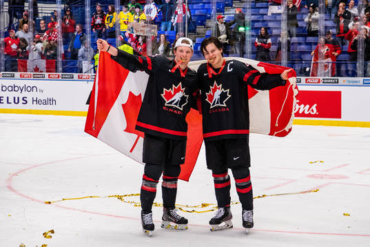 Ty Dellandrea and Barrett Hayton of Canada celebrate