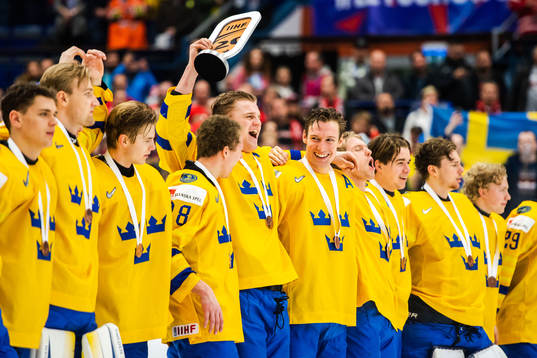 Adam Ginning of Sweden celebrate with the trophy