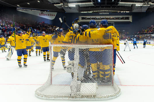 Players of Sweden celebrate