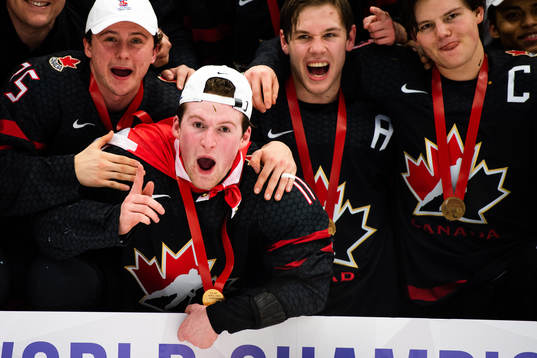 Alexis Lafreniere of Canada celebrates