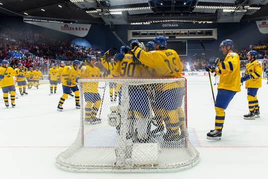Players of Sweden celebrate