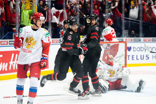 Akil Thomas and Raphael Lavoie of Canada celebrate