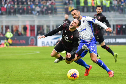 Davide Calabria of Milan and Fabio Quagliarella of Sampdoria