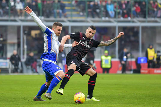 Karol Linetty of Sampdoria and Davide Calabria of Milan