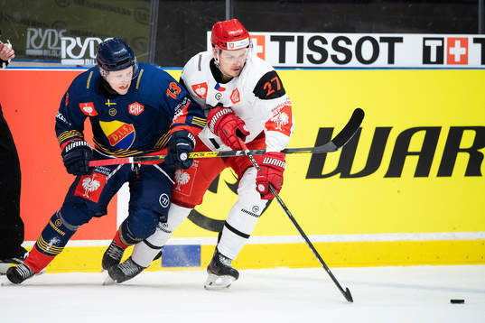 Kalle Östman of Djurgården and Oskars Cibulskis of