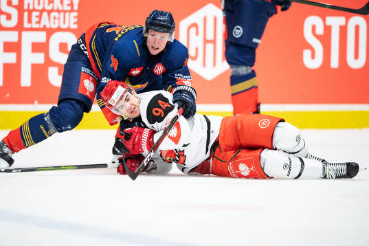 Simon Johansson of Djurgården and Jordann Perret of
