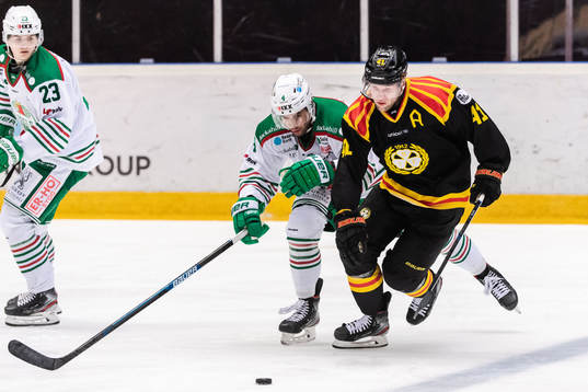 Rögles Kodie Curran och Brynäs Greg Scott