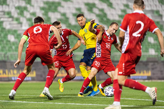 Jordan Larsson of Sweden compete for the ball with Sergiu