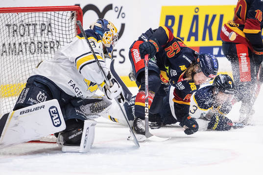 s målvakt Jonas Gunnarsson och Markus Lauridsen