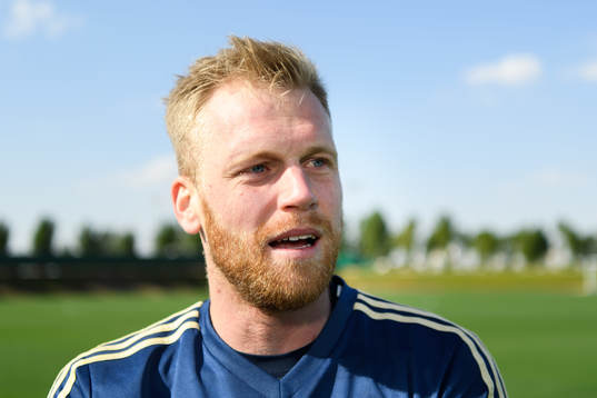 Goalkeeper Peter Abrahamsson is being interviewed