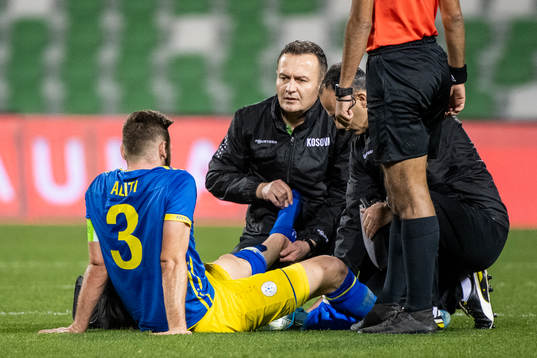 Fidan Aliti of Kosovo receives medical attention
