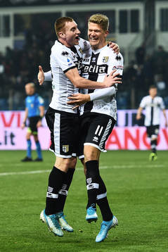 Dejan Kulusevski and Andreas Cornelius of Parma celebrate