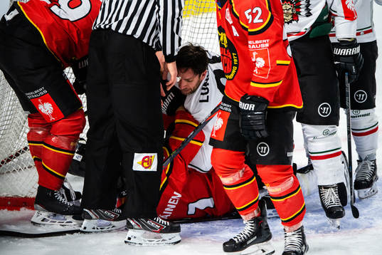 Joel Lundqvist of Frölunda fights Juhani Tyrväinen of