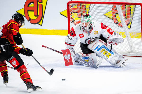 Jonas Berglund of Luleå against goalkeeper Johan Mattsson
