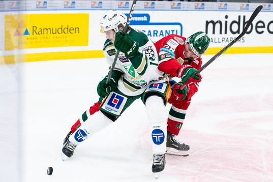 Färjestads Oskar Bäck och Frölundas Johan Sundström
