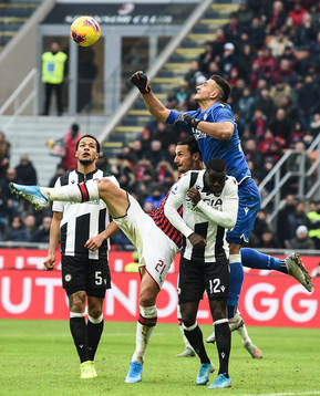 Zlatan Ibrahimovic of AC Milan and Ken Sema of Udinese
