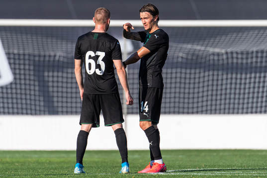 Nikita Sergeev talking with Kristoffer Olsson of Krasnodar