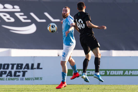 Jo Inge Berget of Malmö FF and Andrey Ivanshin of Krasnodar