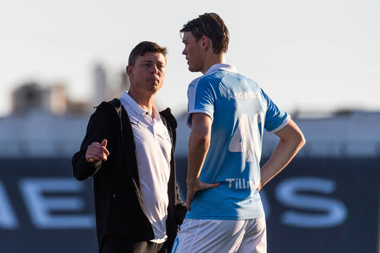 Jon Dahl Tomasson, head coach talking to Hugo Andersson of