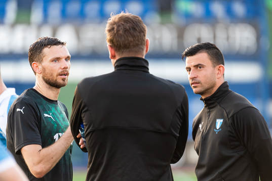 Marcus Berg of Krasnodar talking to goalkeeper Johan Dahlin