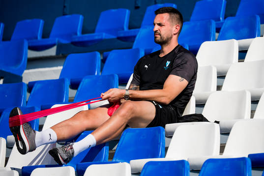 Injured goalkeeper Dusan Melicharek in the stands