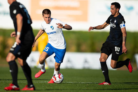 Carl Björk of Norrköping and Carlos Zeca of Köpenhamn