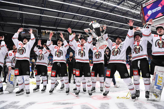 Players of Frölunda celebrate with the trophy