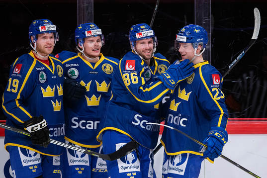 Mathias Bromé of Sweden celebrates with his team mates