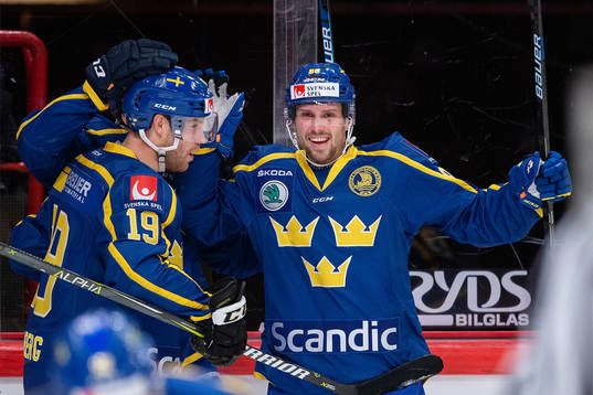 Oscar Lindberg and Mathias Bromé of Sweden celebrate