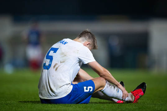 Christoffer Nyman of Norrköping look dejected due to injury