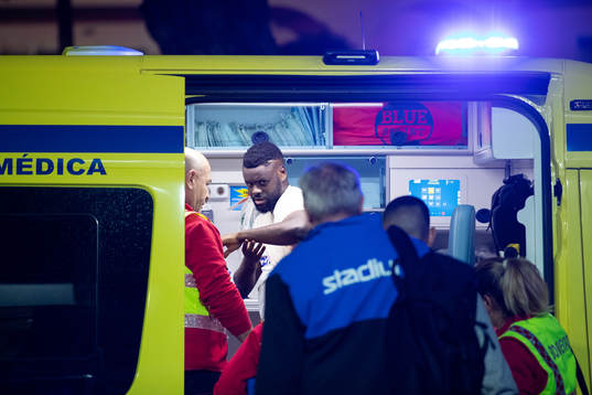 Maic Sema of Norrköping leaves the arena in an ambulance