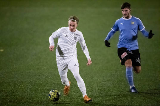 Kalmars Isak Magnusson och Mjällbys Mohanad Jeahze