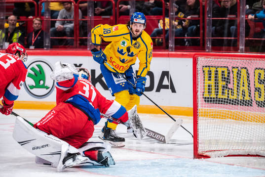 Dennis Everberg of Sweden and goalkeeper Alexander Samonov