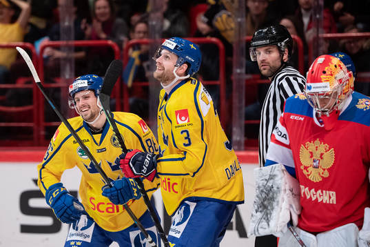 Mathias Bromé and Klas Dahlbeck of Sweden celebrate the