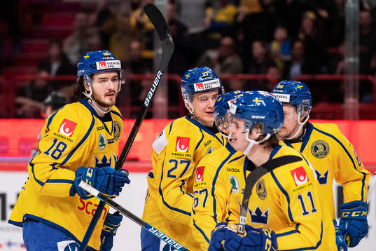 Dennis Everberg, Nils Lundkvist and Samuel Fagemo celebrate