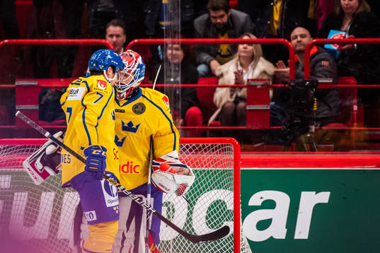Goaltender Lars Johansson and Henrik Tömmernes of Sweden
