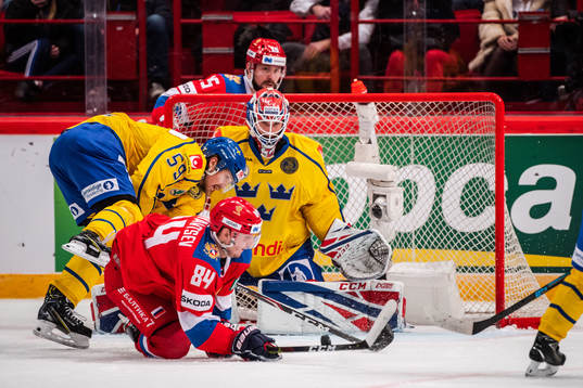 Linus Johansson and goaltender Lars Johansson of Sweden