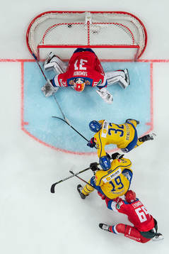 Lukas Bengtsson of Sweden scores 4-1 behind goalkeeper