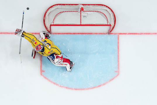 goaltender Lars Johansson of Sweden with a save