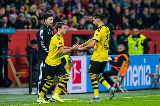 Mario Götze changes with Marius Wolf of Borussia Dortmund