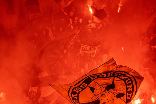 Supporters of Borussia Dortmund with pyro